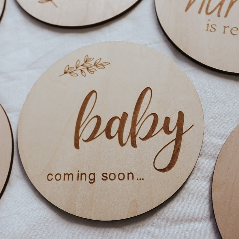 wooden milestone discs. pregnancy milestones. engraved. its a boy, girl, baby coming soon, hospital bag packed, your nursery is ready, we cant wait to meet you, i cant see my toes, we are having a baby.