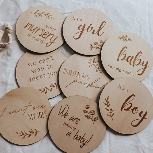 wooden milestone discs. pregnancy milestones. engraved. its a boy, girl, baby coming soon, hospital bag packed, your nursery is ready, we cant wait to meet you, i cant see my toes, we are having a baby.
